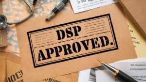 A collection of medical reports and documents and papers with a 'DSP Approved' stamp