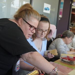 working with the ndis includes a support worker amongst other team members