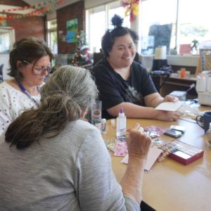 ndis support worker with participants at SALT activity hub